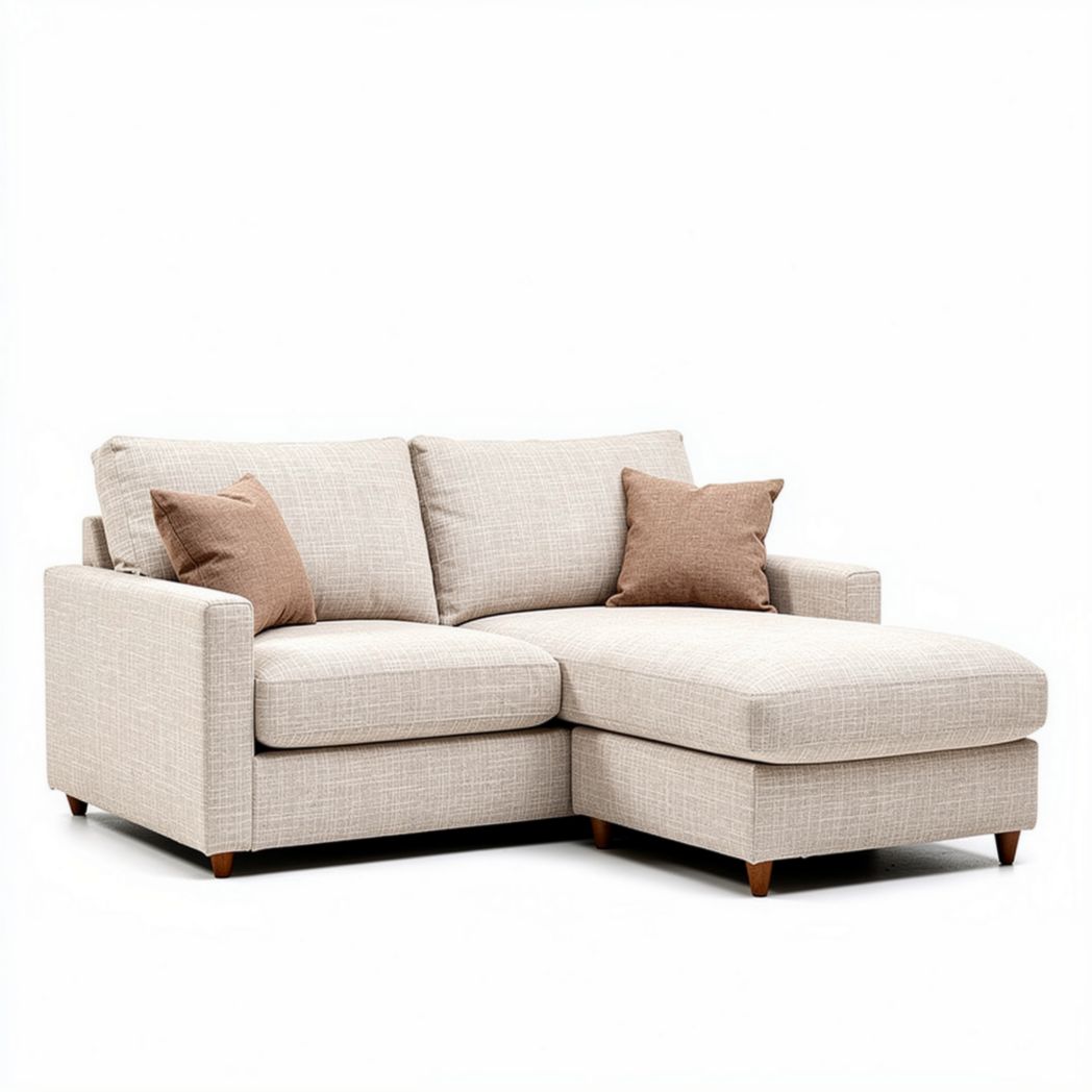 L-vormige bank in lichtbeige stof met kussens 230 x 150 x 90cm